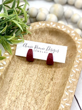 Load image into Gallery viewer, Crimson Clay Huggie earrings