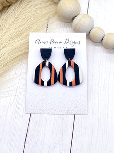 Black, Orange, & White Clay Keyhole earrings