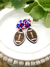Load image into Gallery viewer, Handpainted Wooden Football earrings with pom pom toppers