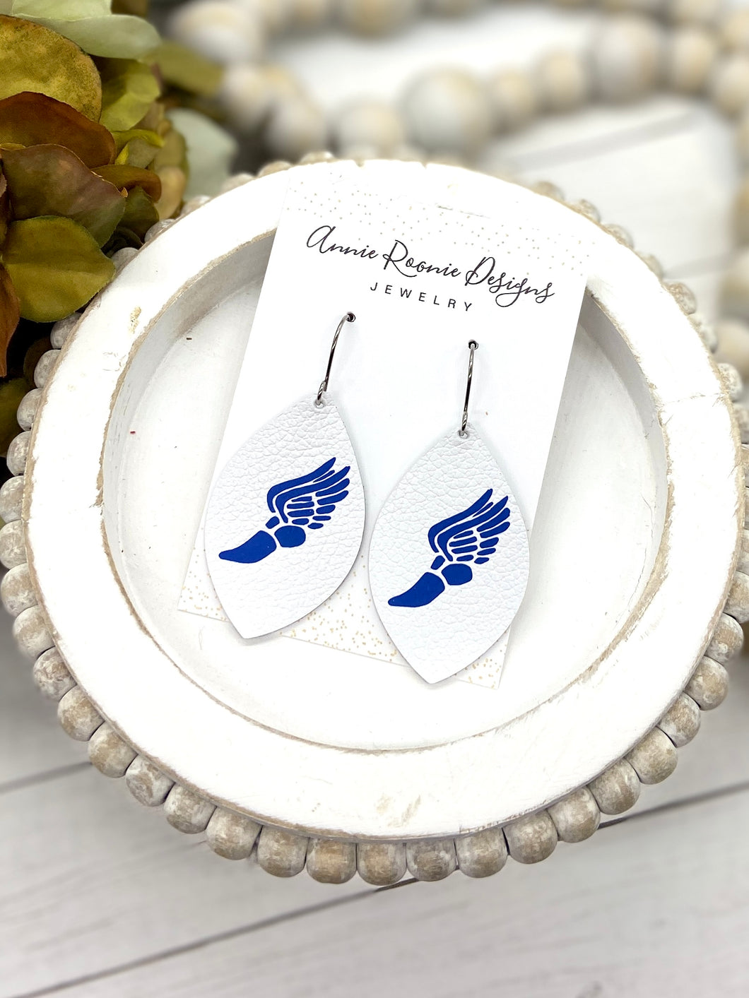 Track feet Marquis earrings