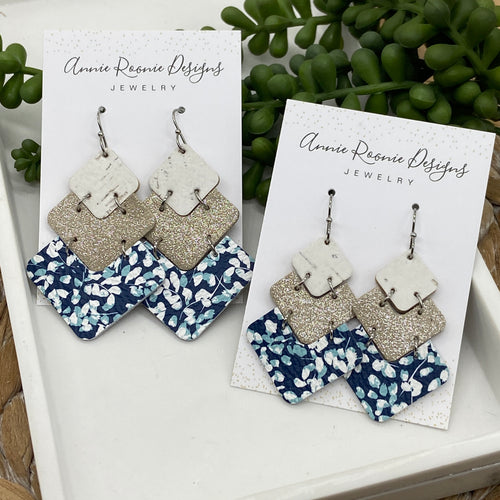 Vivi earrings in Blue & Platinum Gold leathers