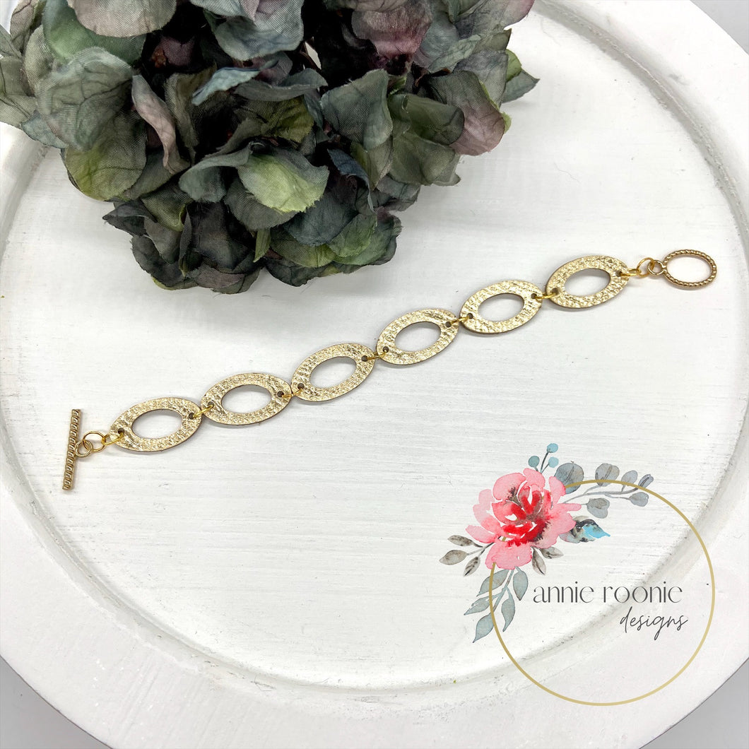 Gold leather link bracelet